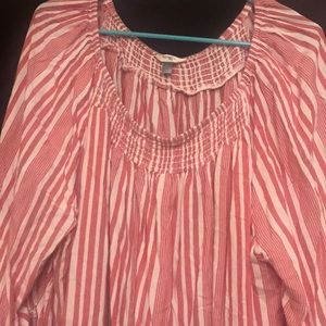 Red and white striped ruffled blouse.